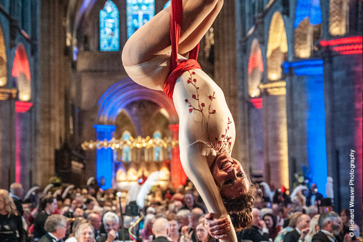 Francesca Carlson of Wye Circus CIC performs at Hereford Cathedral Nave Dinner. Photograph credit: Richard Weaver Photography