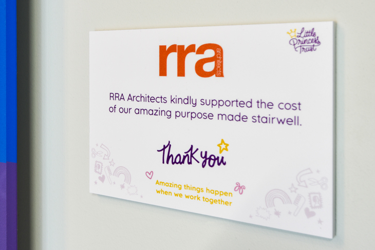 Sign reading "RRA Architects kindly supported the cost of our amazing purpose made stairwell."