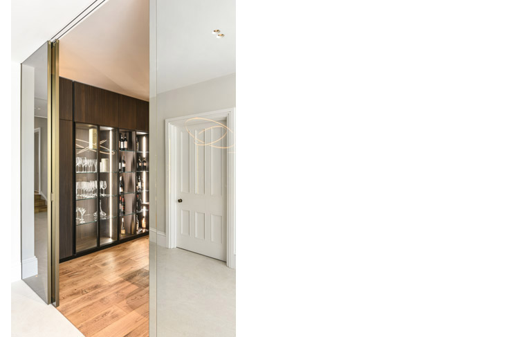 Glass doors to contemporary wine room installed to restored Georgian, detached property.