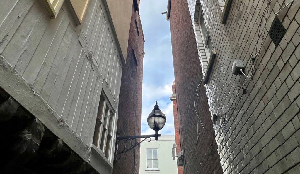 A mix of medieval and Georgian facades can be seen in the alleyways of Westgate Street
